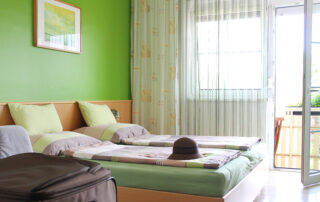 Zimmer grün im Gästehaus Lokalaugenschein